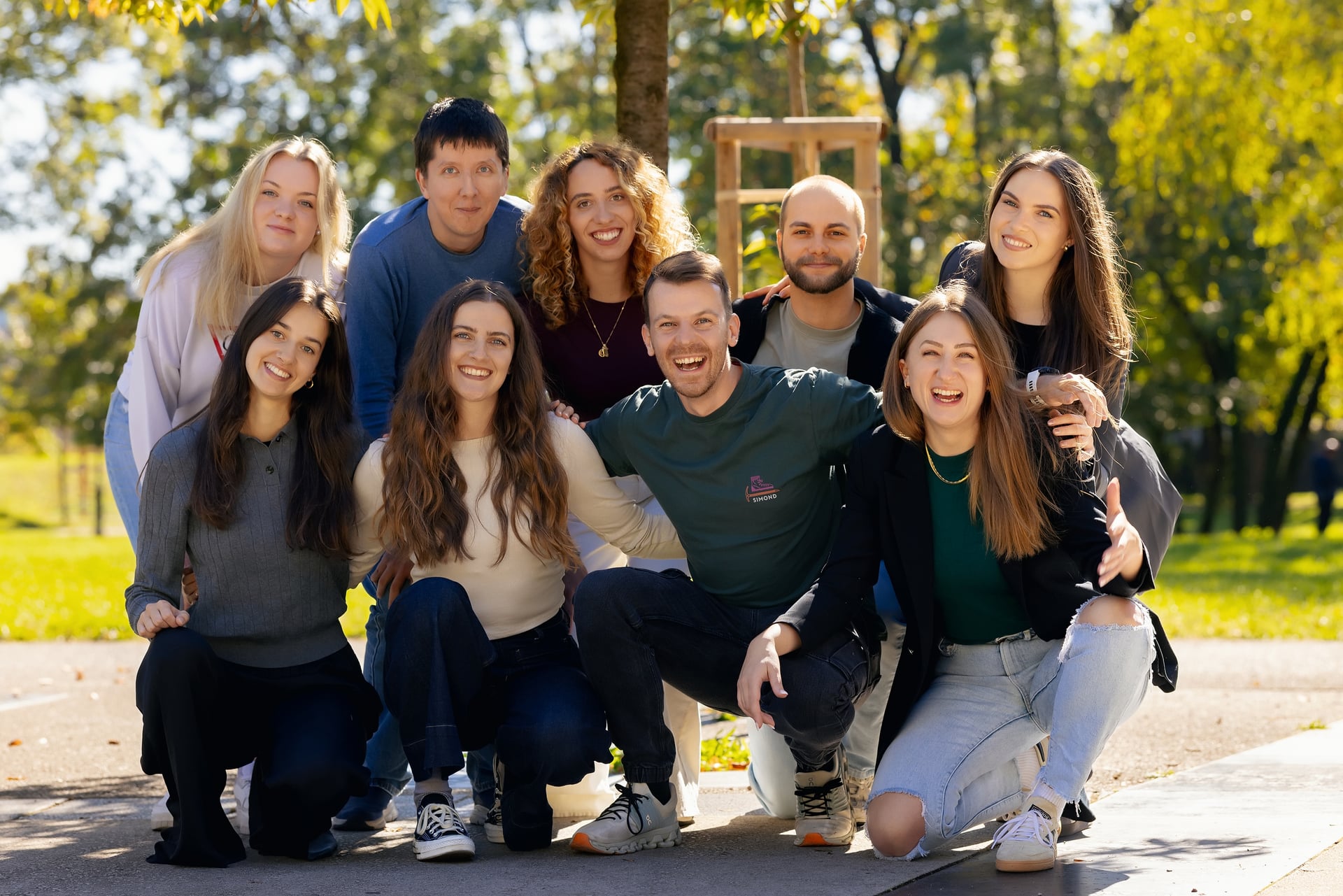 The hiking team behind Albania Hiking Tours, smiling together in a park