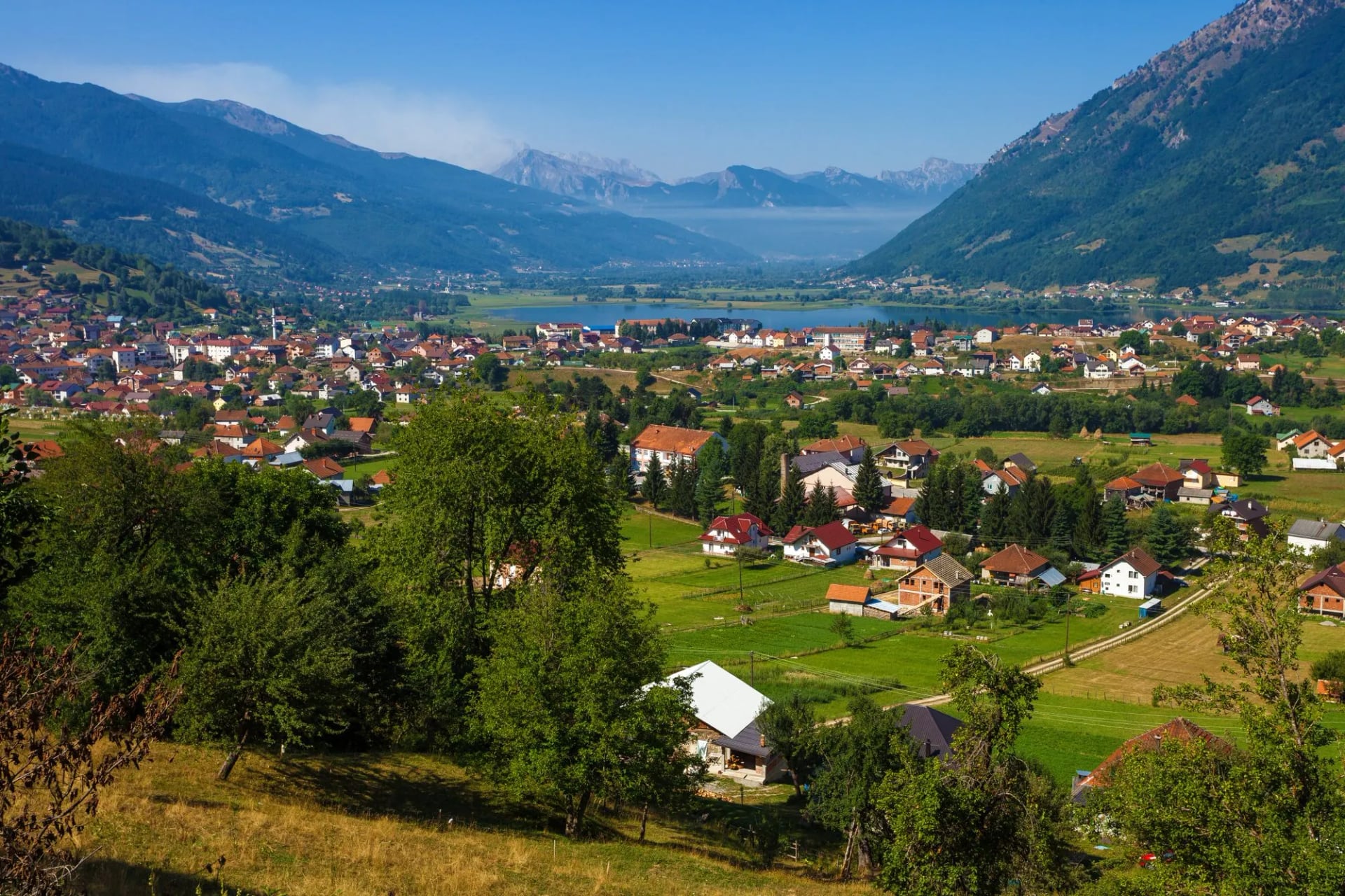 Plav and its lake below the Prokletije mountains