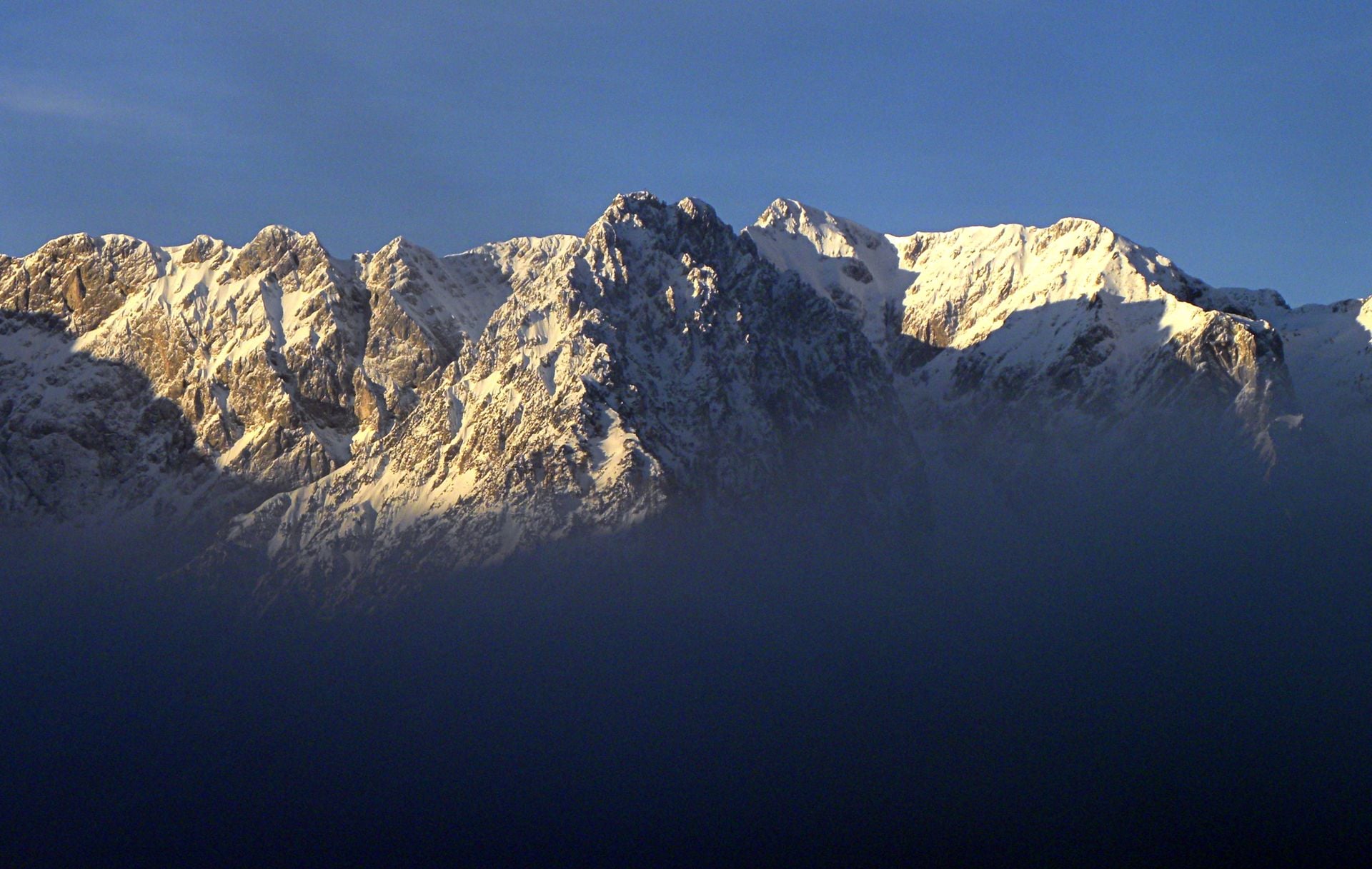 Look for snow on the high ridges well into July