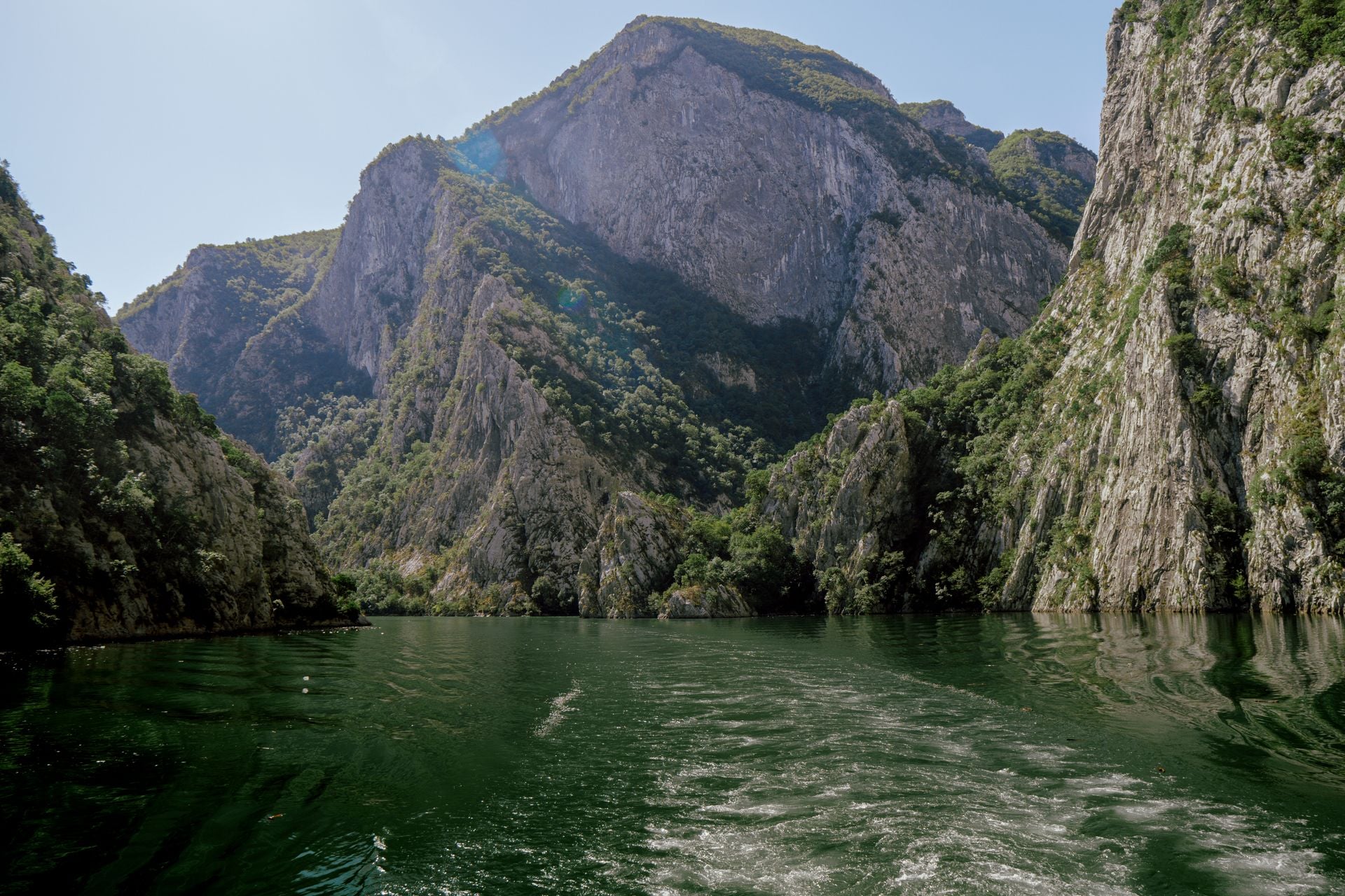 Watch the walls close in on Lake Koman from the deck