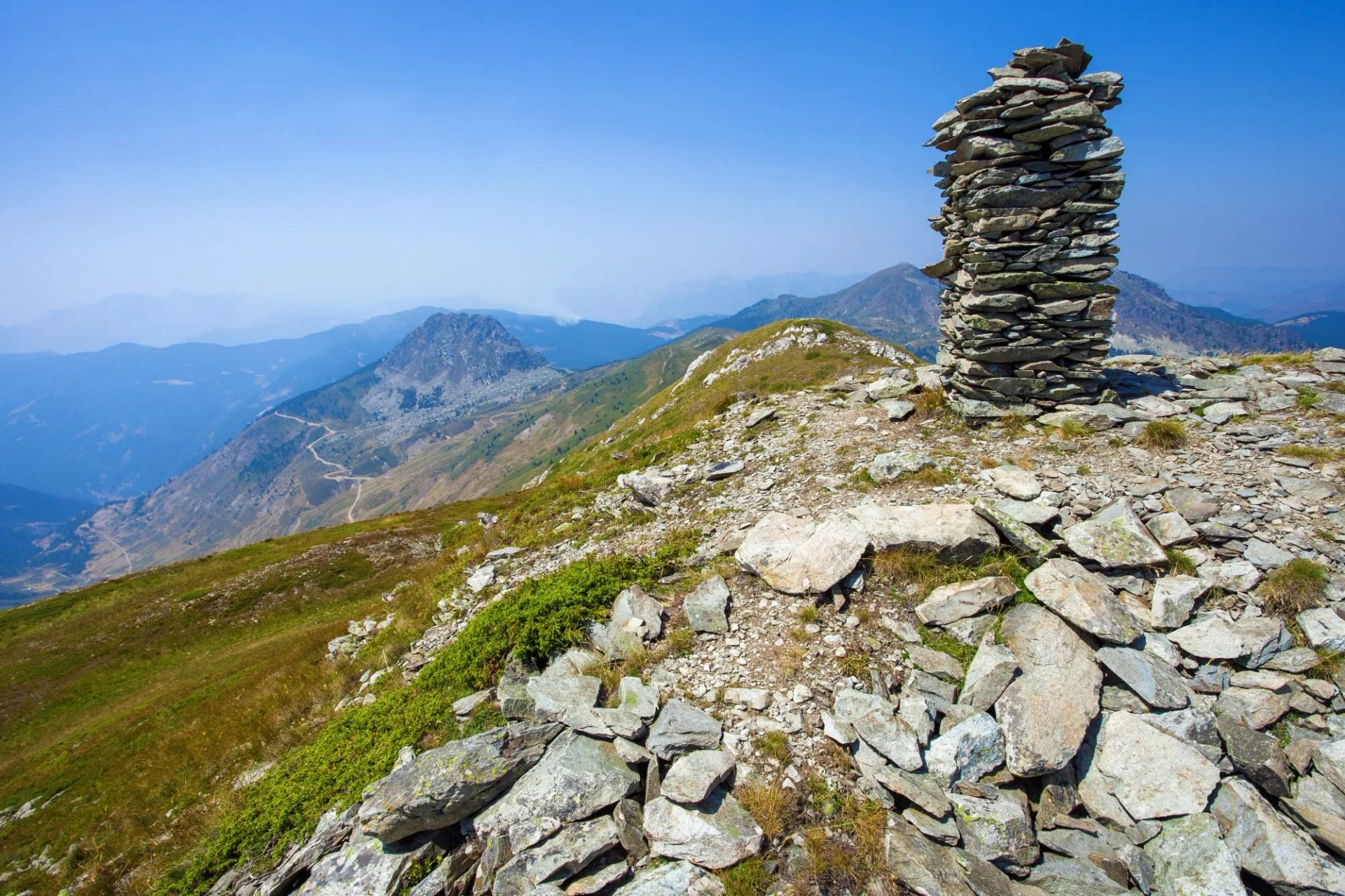 The summit cairn on Tromeda's border ridge