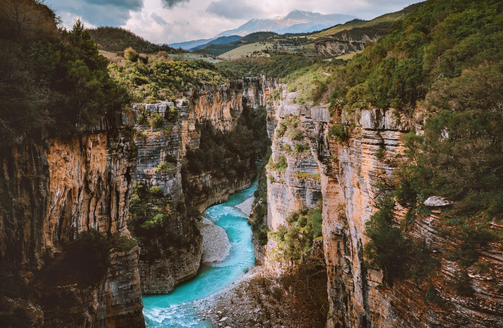 Walk the Osum canyon in May when the river is high